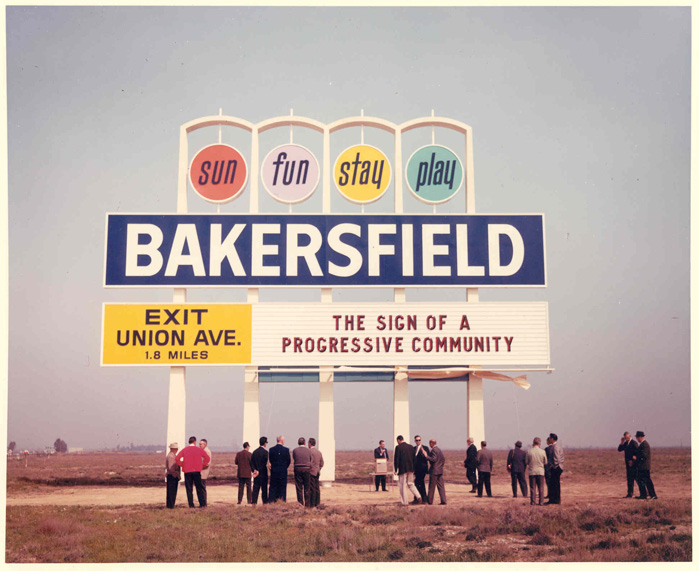 An image of the old Bakersfield roadside welcome sign indicating that Bakersfield is a progressive community