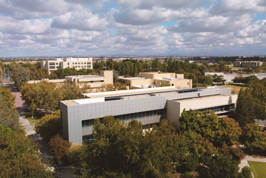 CSUB campus under a partly cloudy sky