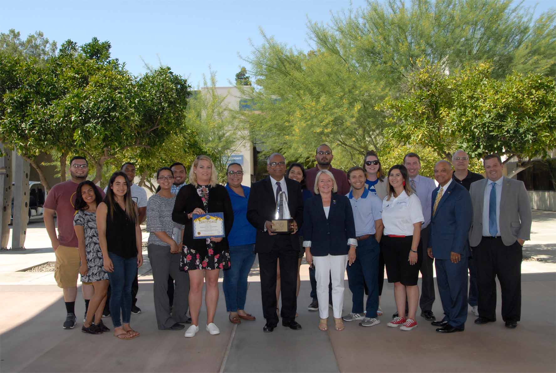 Business & Public Administration recieveing Most Beautiful Area on Campus award