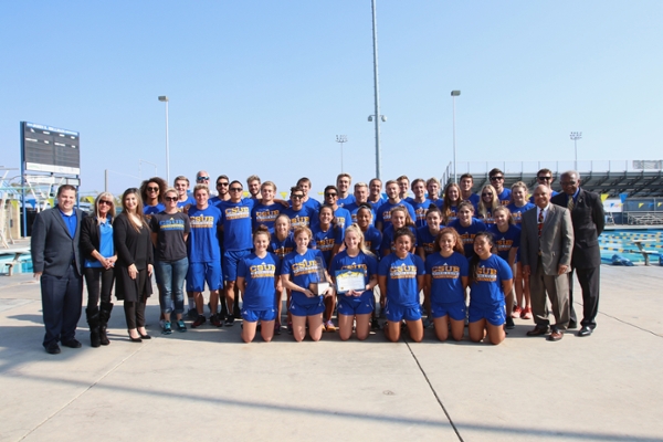 CSUB Swim Team recieveing Most Beautiful Area on Campus award