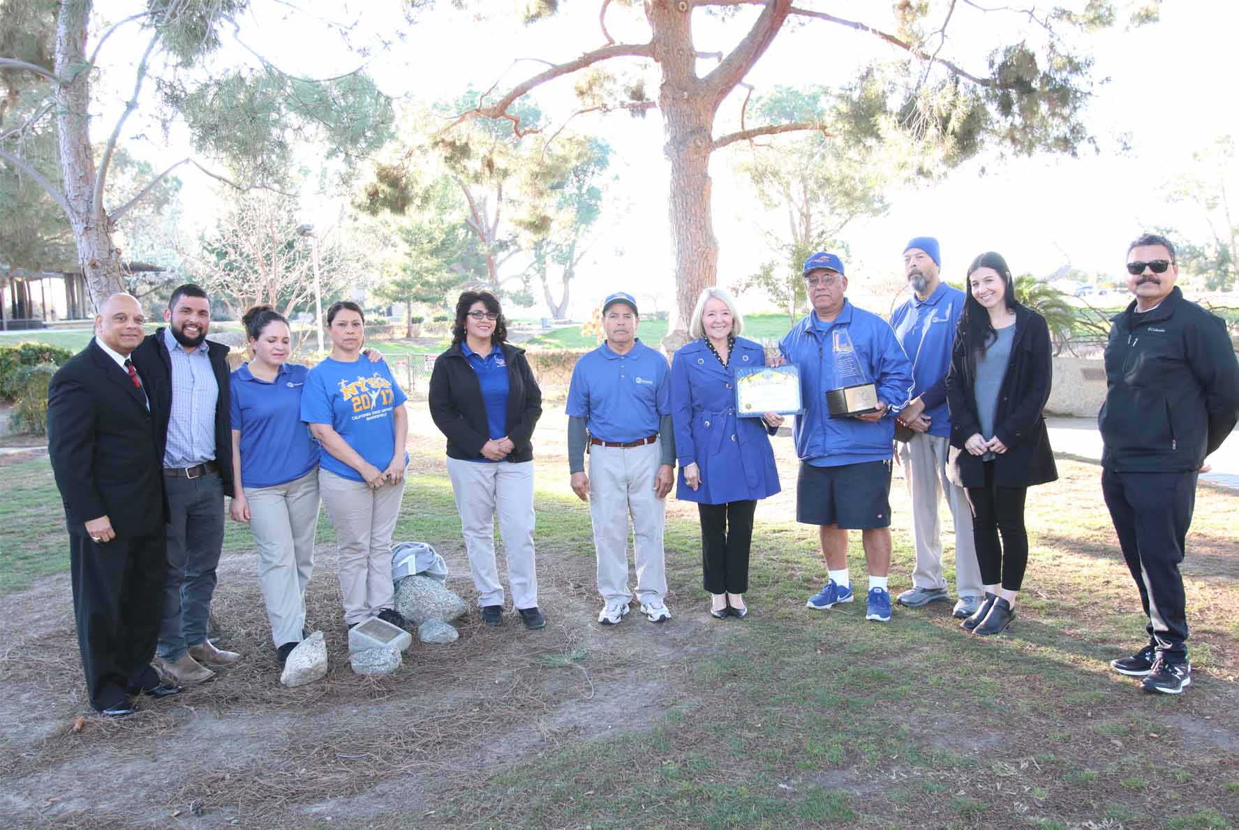 Joseph Mendez, Custodial Department recieveing Most Beautiful Area on Campus award