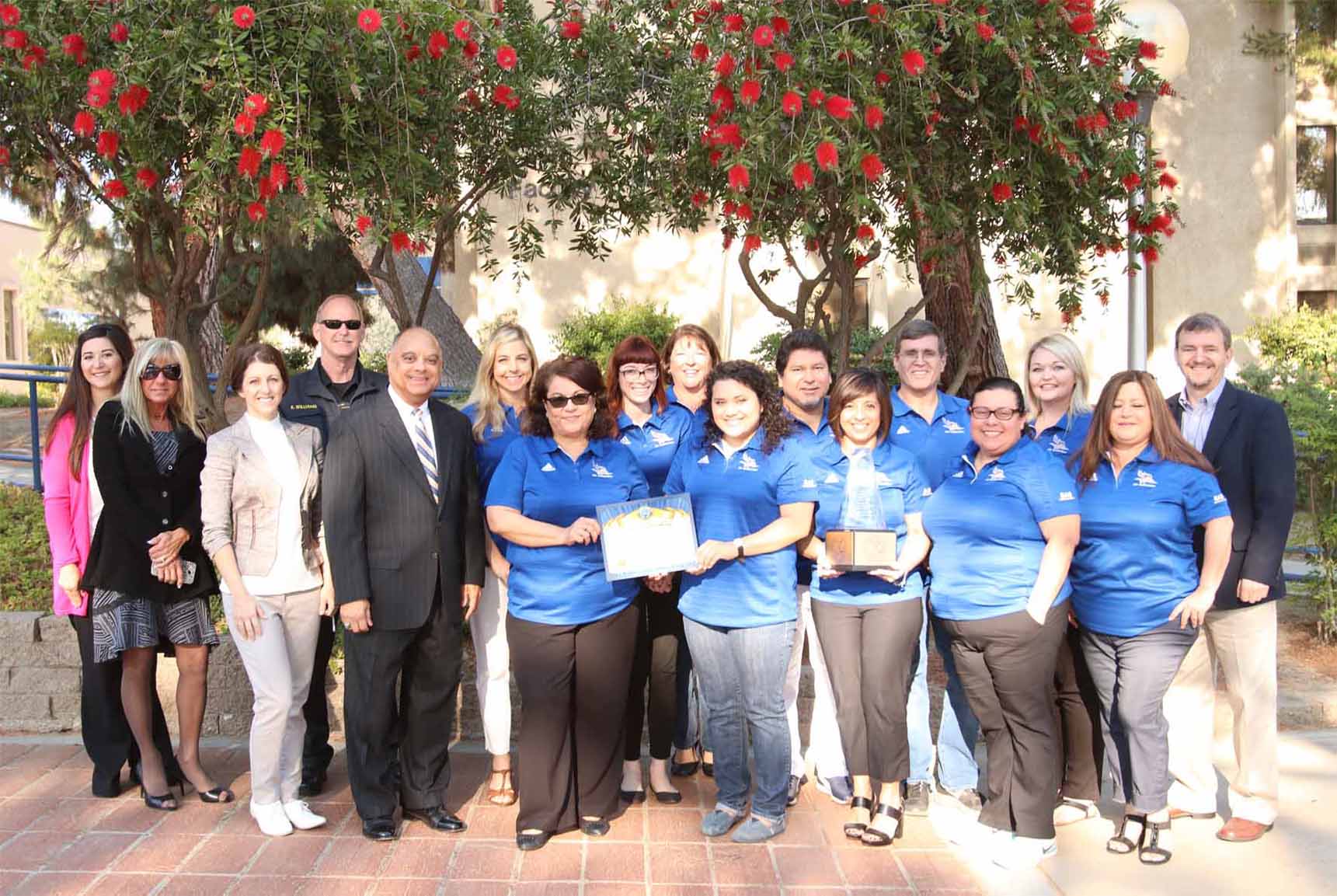 Payroll Services recieveing Most Beautiful Area on Campus award