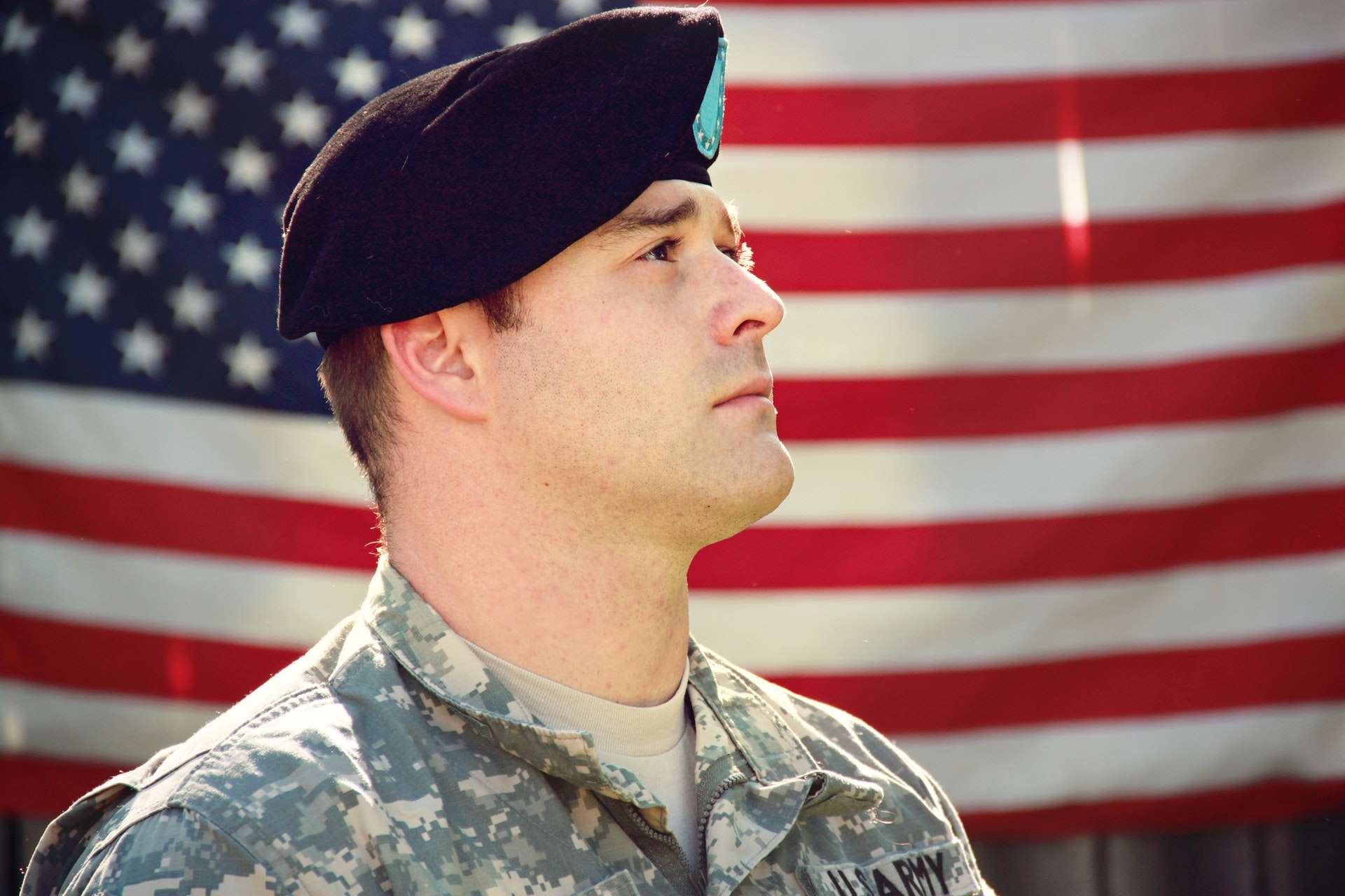 Veteran in front of US flag