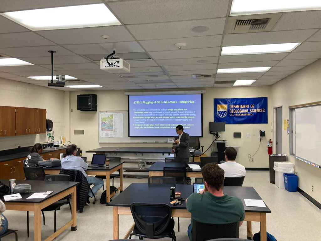Dr. John Yu leads an oil regulation workshop Dr. John Yu leads an oil regulation workshop