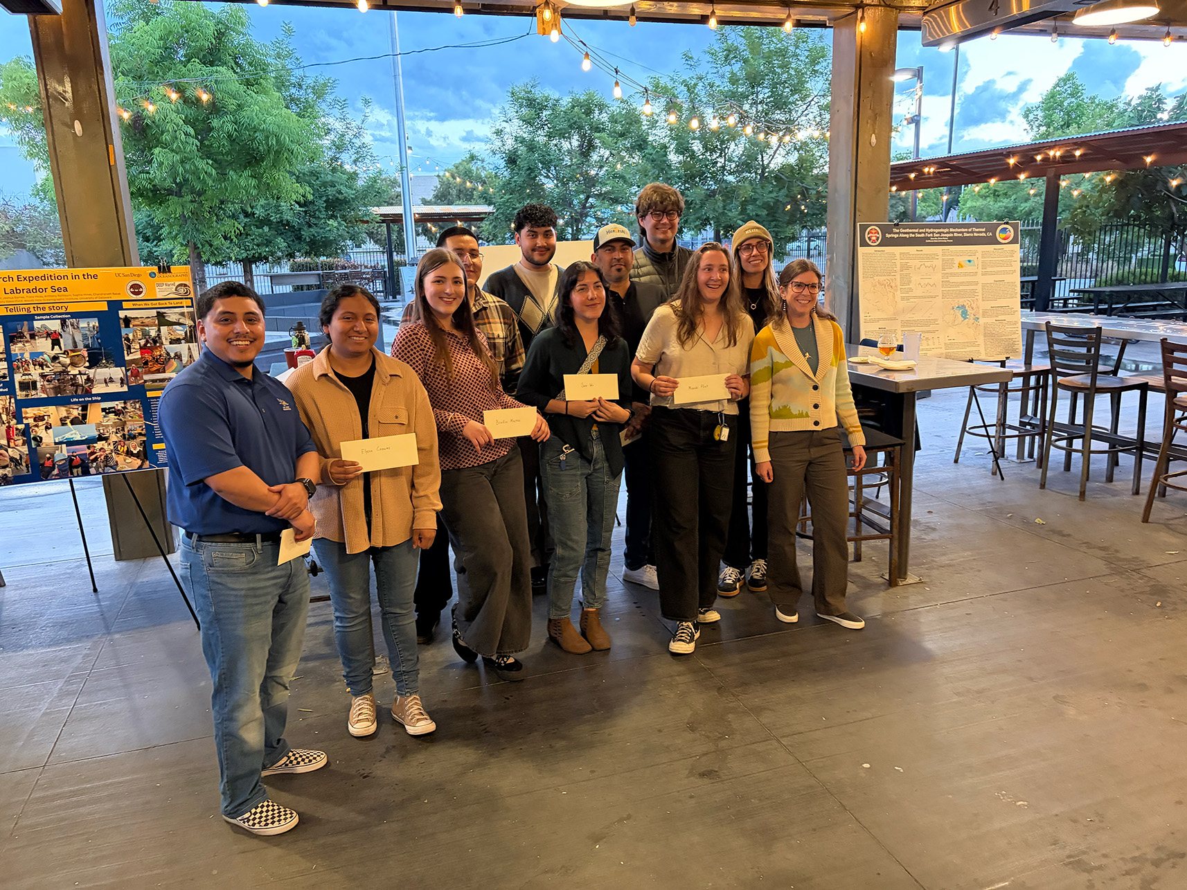 Scholarship recipients from CSUB and Cal State Fresno smile with their awards