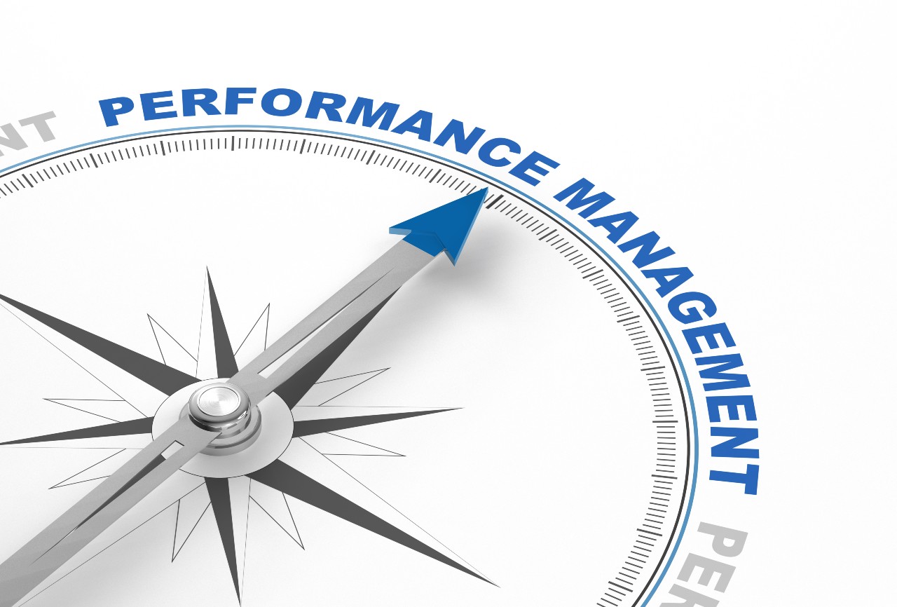 Compass with Performance Evaluation written on the north end