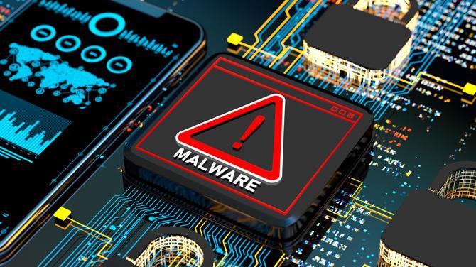 Close up shot of PC motherboard with component that says "Malware"