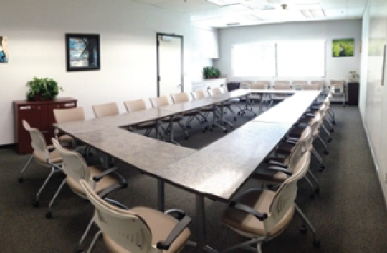 Student Union Blue Room with tables forming a hollow square layout