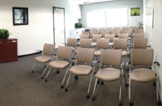 Student Union Blue Room in a conference layout with chairs in rows.