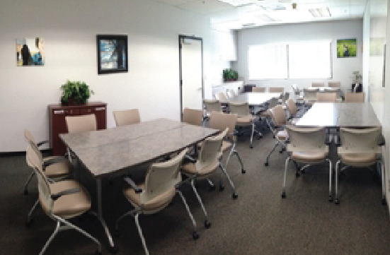 Student Union Blue Room with tables in small groups