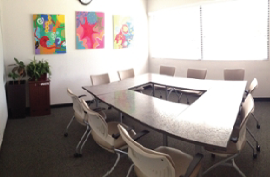 Student Union Yellow Room with tables forming a hollow square.