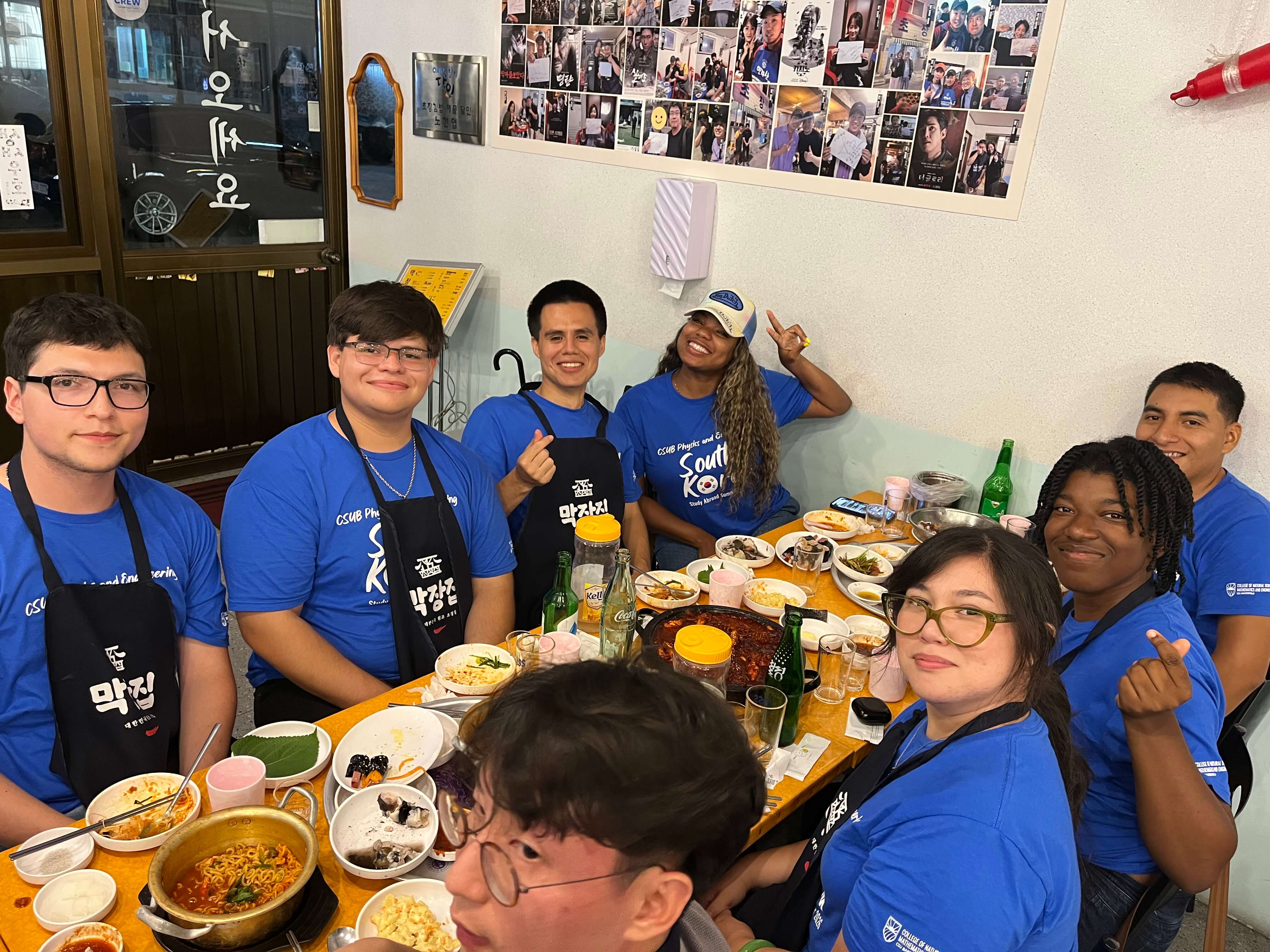 FLP Korea students enjoying local cuisine together in their group t-shirts.