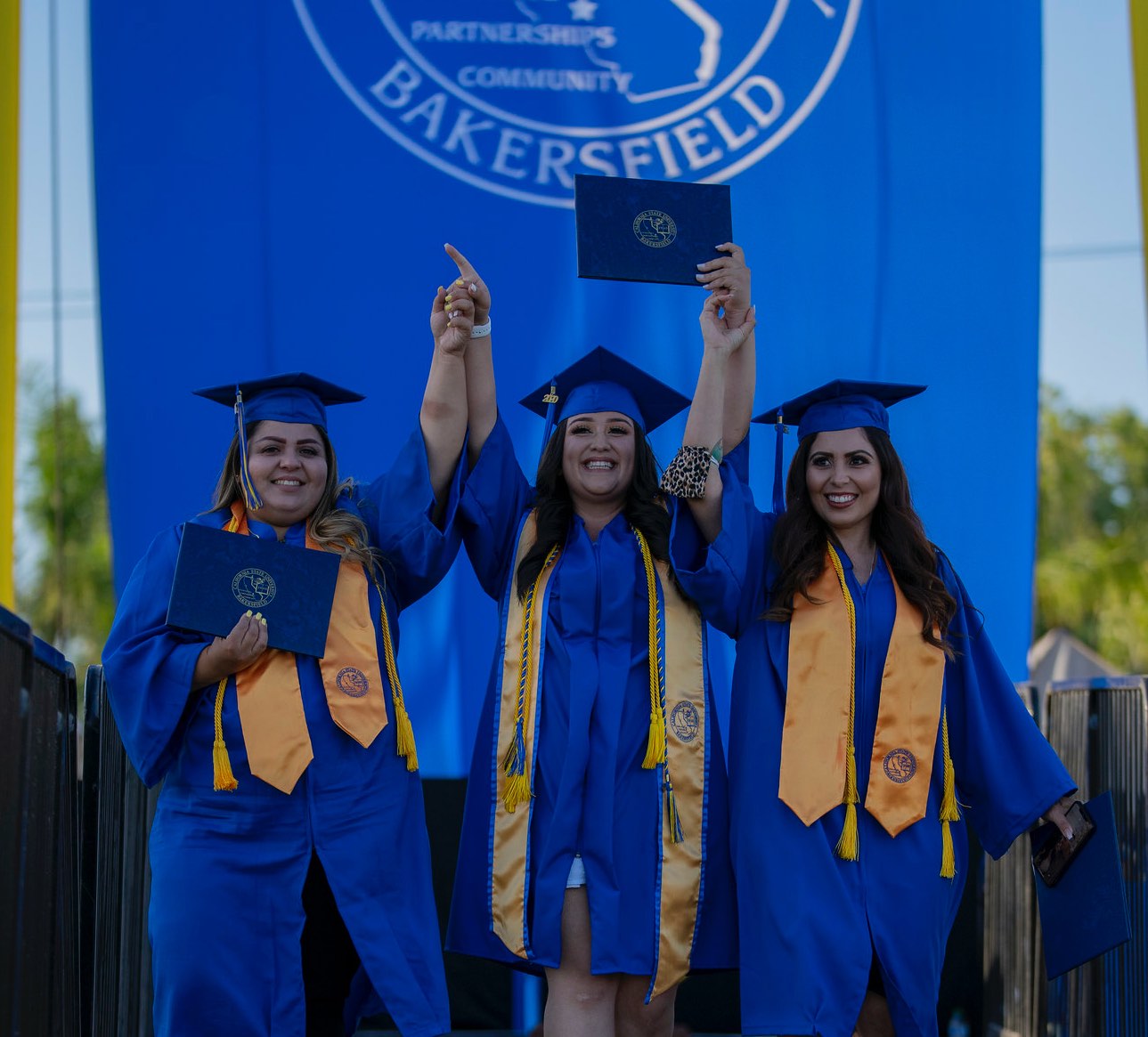 CSUB graduates celebrating their accomplishments.
