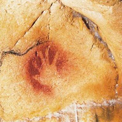 Hand stencil in the Chauvet-Pont-d'Arc Cave